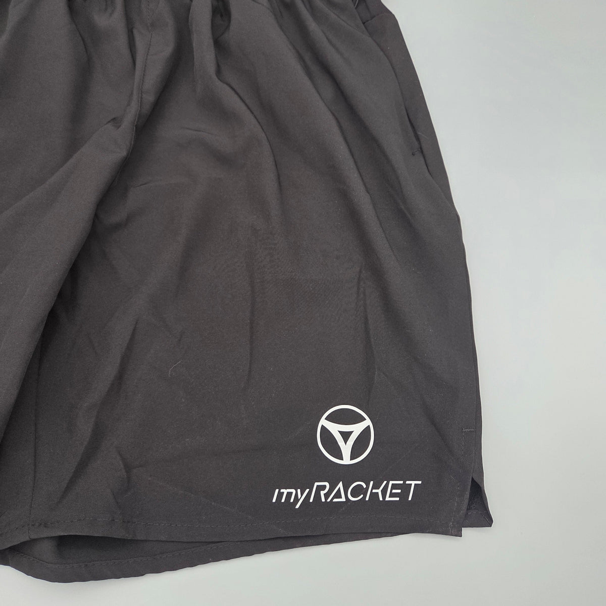 Pantalon de sport myRacket – détail de la ceinture élastique et des poches latérales