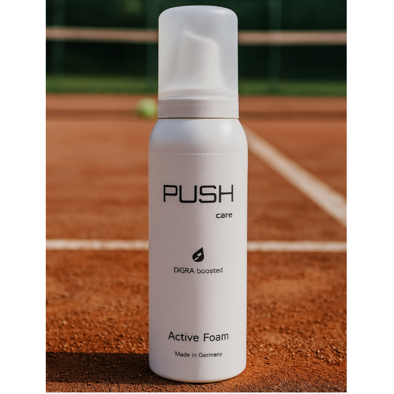 PUSH Wärmeschaum für Tennis in weißer Dose auf dem Sandplatz